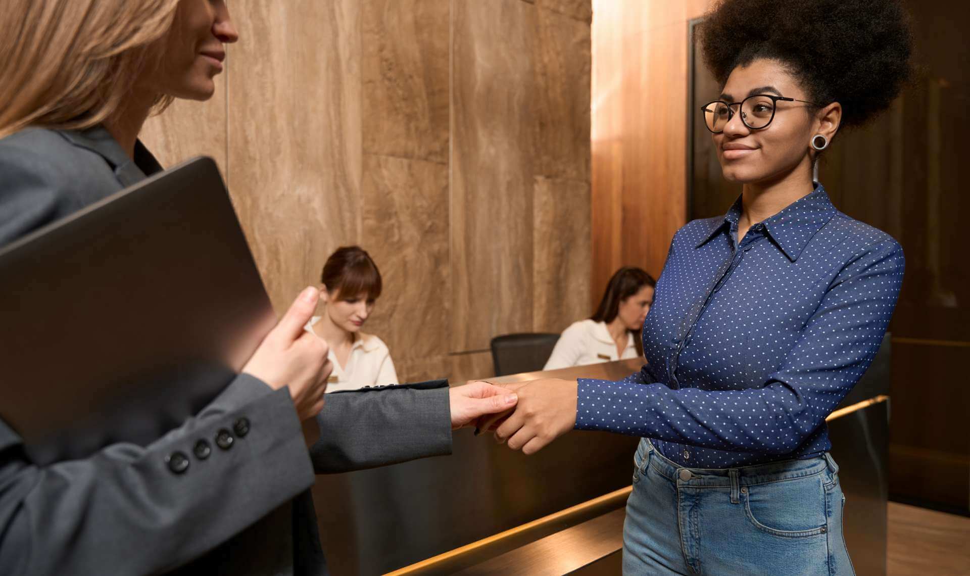 Women shaking hands